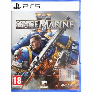 The image shows the box for the PS5 game Warhammer 40,000: Space Marine 2. The cover illustration shows a heavily armed man holding a sword in his left hand and a firearm in the other. His armor is gold and blue and is disproportionately larger than his unarmored head. The man is looking to the left and his entire body is turned towards the viewer. Above him is the title of the game Warhammer 40,000: Space Marine 2    